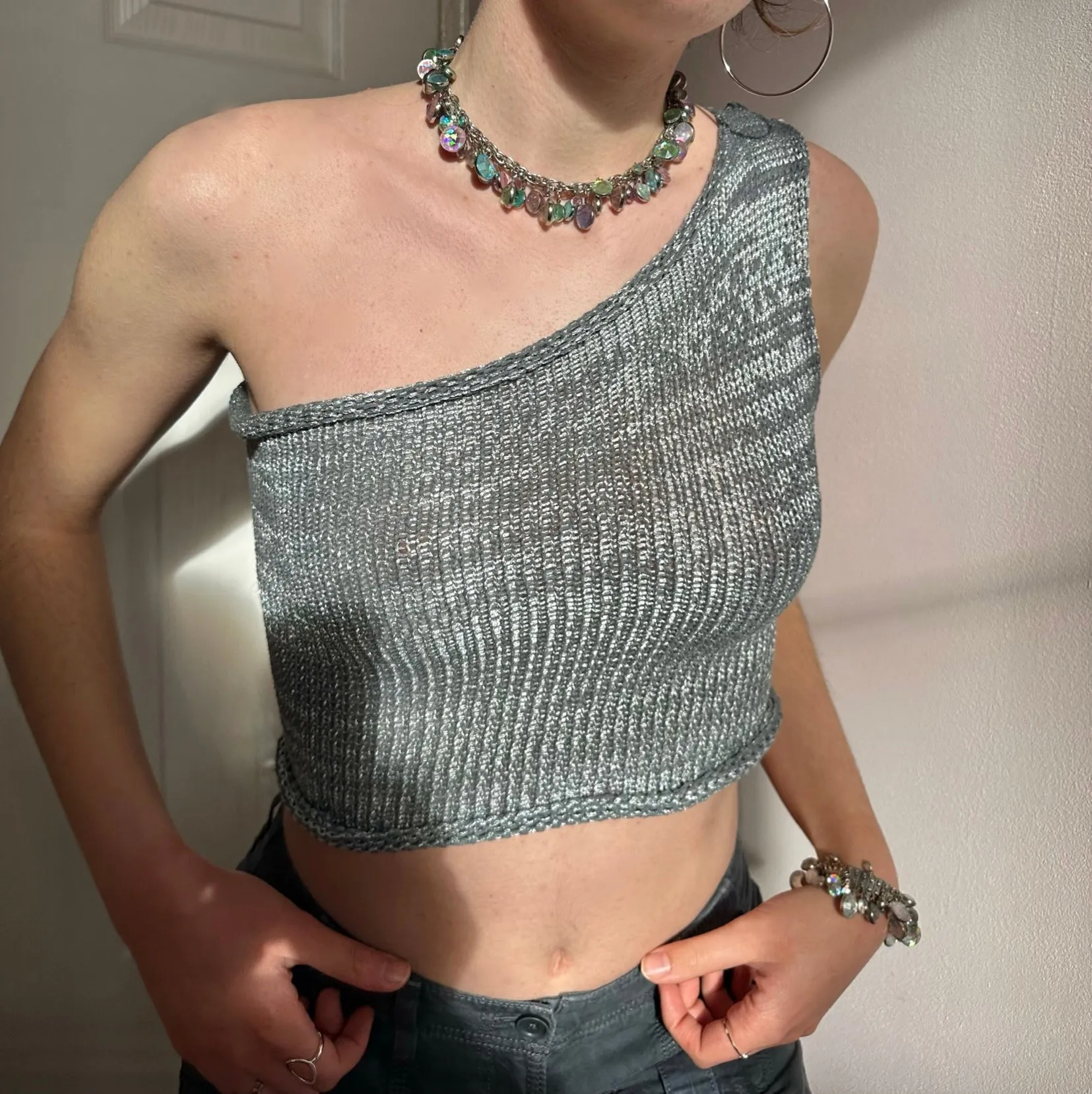 Handmade knitted metallic asymmetrical one shoulder top in silver and grey